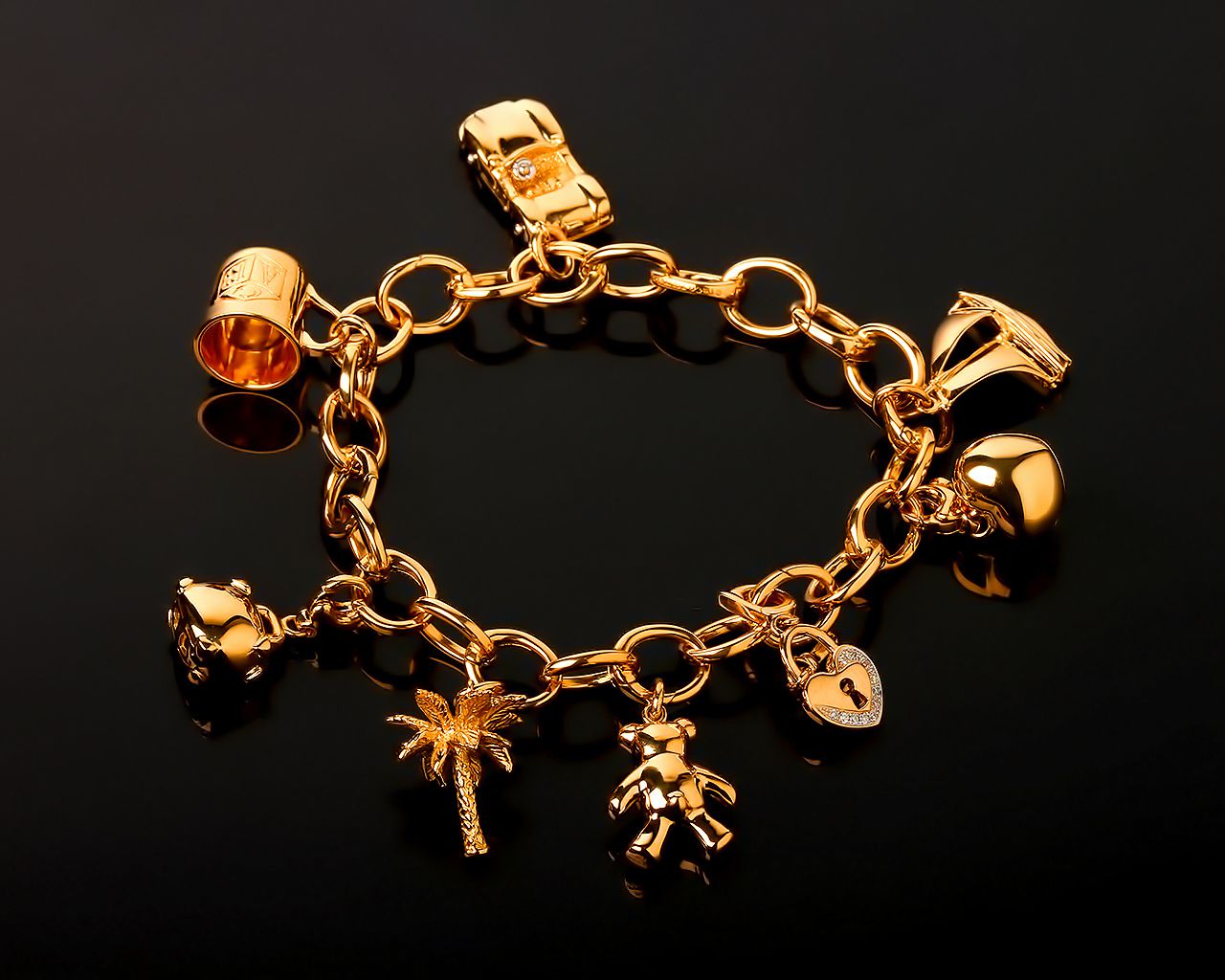 Шикарный золотой браслет Tiffany Charms с шармами из золота под заказ.140916/4